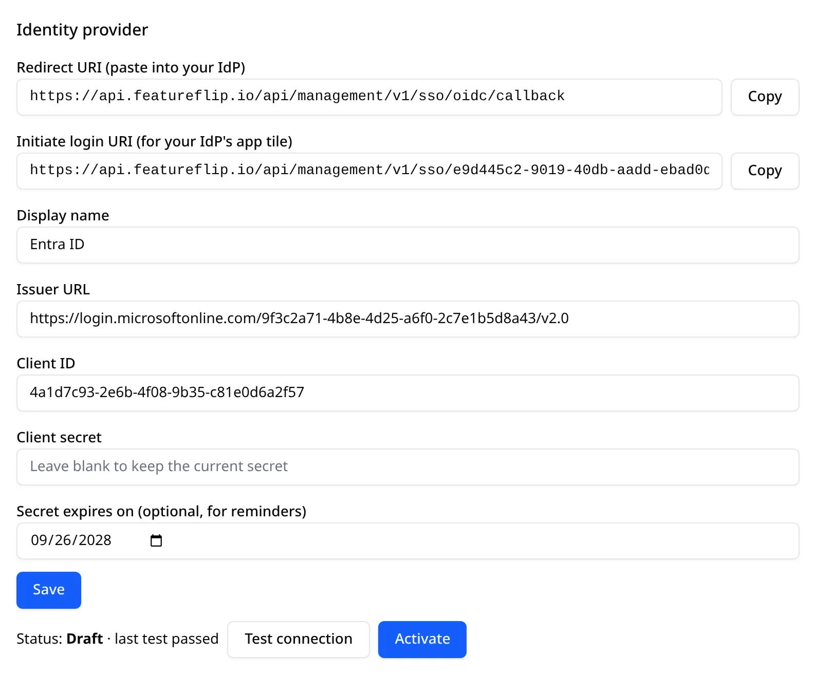 The Identity provider section filled in for Entra ID: display name Entra ID, an issuer of the form https://login.microsoftonline.com/tenant-id/v2.0, the application client ID, a secret expiry date, and the Initiate login URI with a Copy button