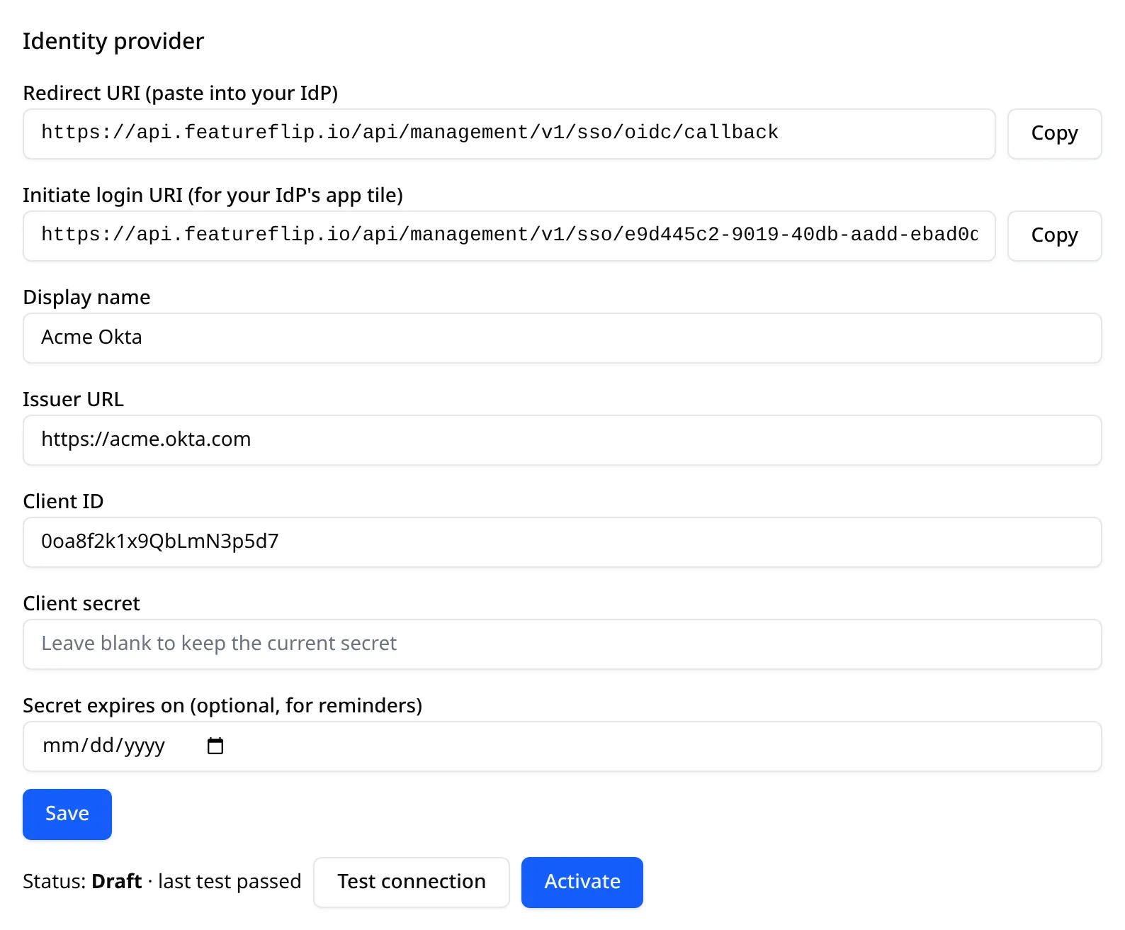 The Identity provider section after saving an Okta connection: display name Acme Okta, issuer https://acme.okta.com, the client ID, and the new Initiate login URI with a Copy button